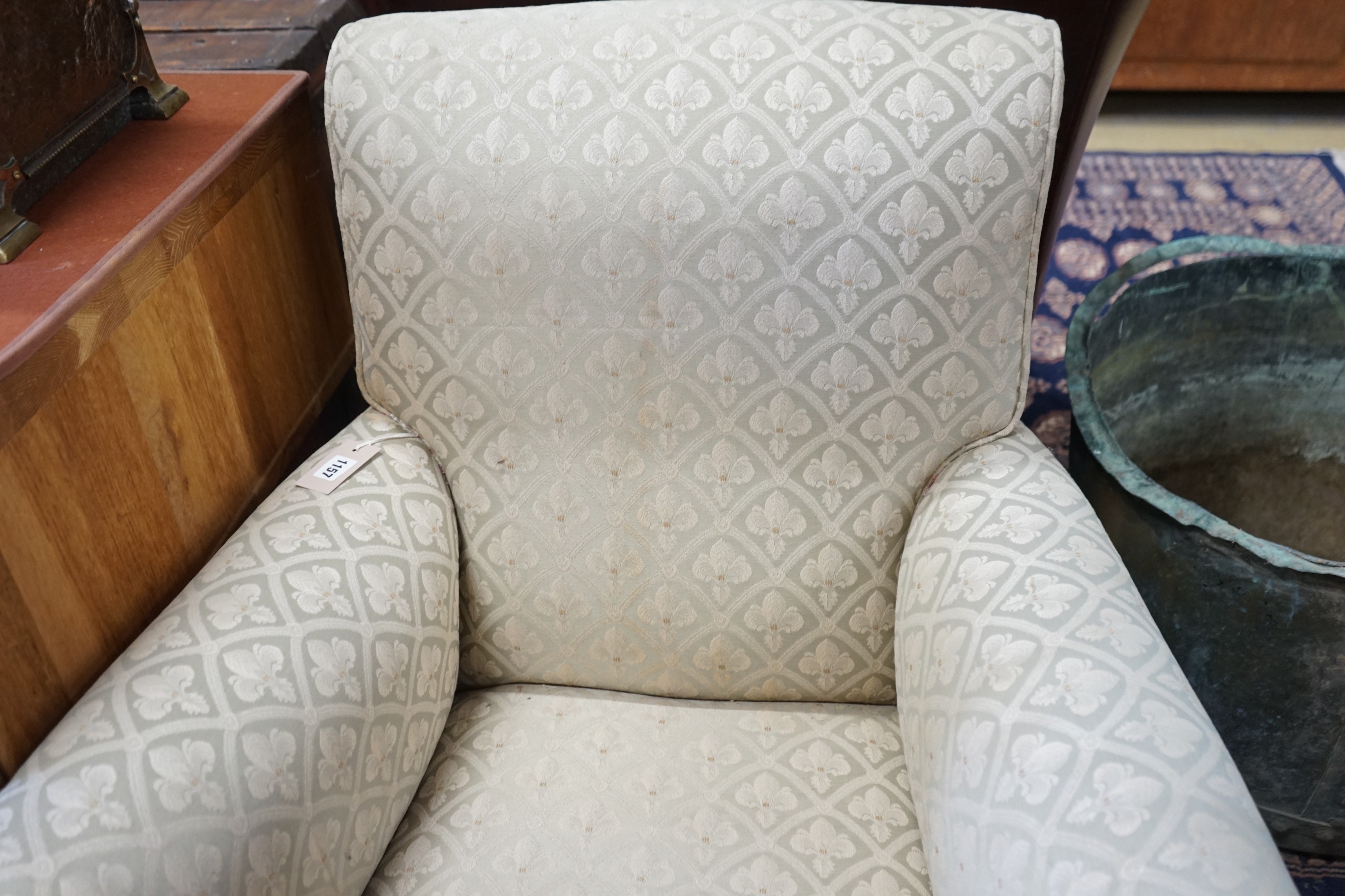 A Victorian upholstered wing armchair, width 76cm, depth 80cm, height 84cm